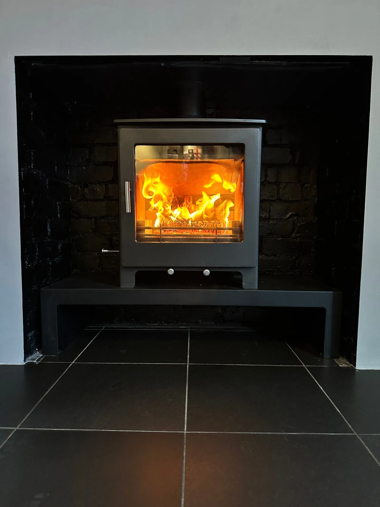 Contemporary stove with slate surround