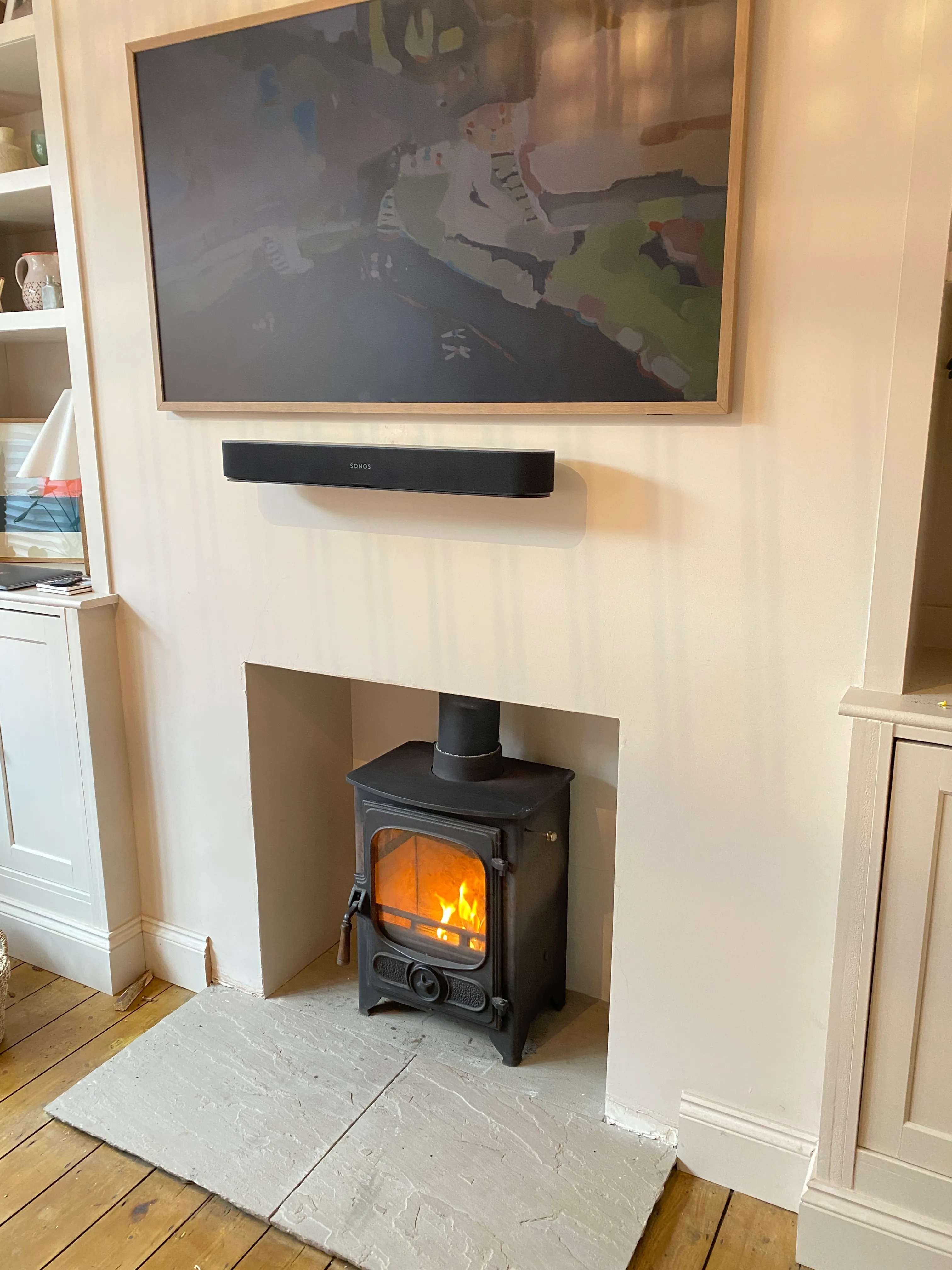 Compact cast-iron stove in a modern kitchen setting